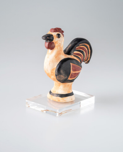 Ancient Greek rooster sculpture on display