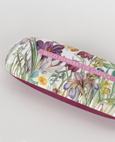Floral glasses case with "Wild Flowers of Greece" text.