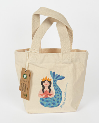 Canvas tote bag with mermaid illustration.