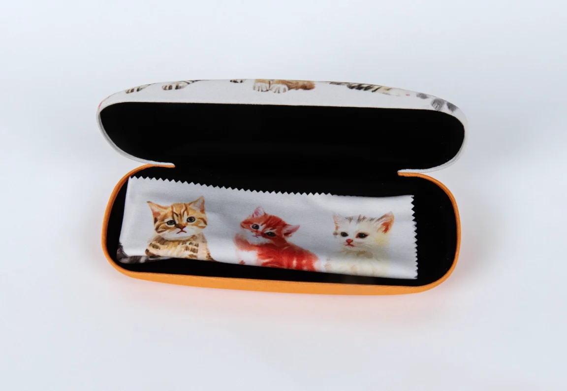Cat-themed eyeglasses case with kitten print interior.