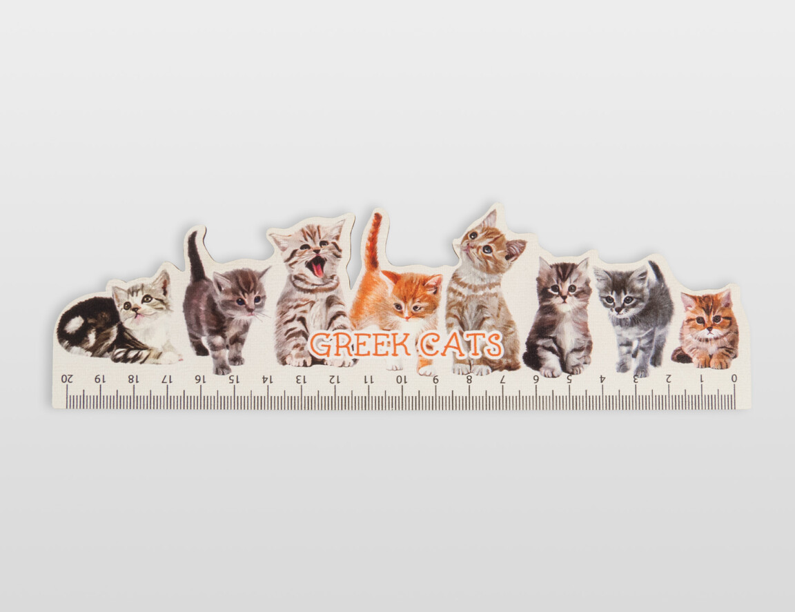 Assorted Greek cat illustrations on a novelty ruler.