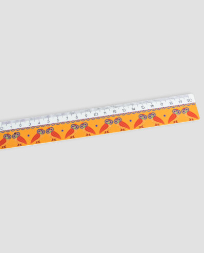 Decorative orange ruler with owl patterns