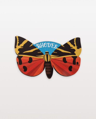 Colorful butterfly-shaped Rhodes emblem textile.
